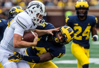 Josh Metellus (14) and Lavert Hill (24)