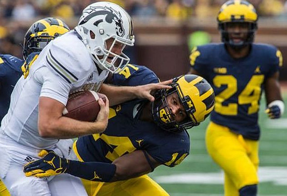 Josh Metellus (14) and Lavert Hill (24)