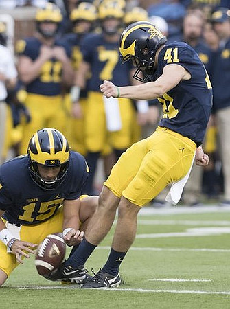 Garrett Moores (15) and Ryan Tice (41)