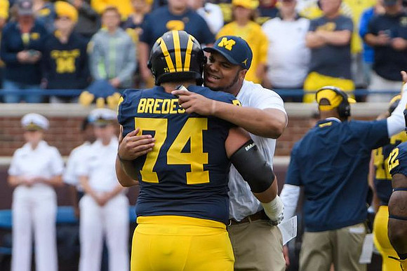 Ben Bredeson (74) and Grant Newsome (77)
