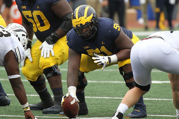 Michael Onwenu (50) and Cesar Ruiz (51)