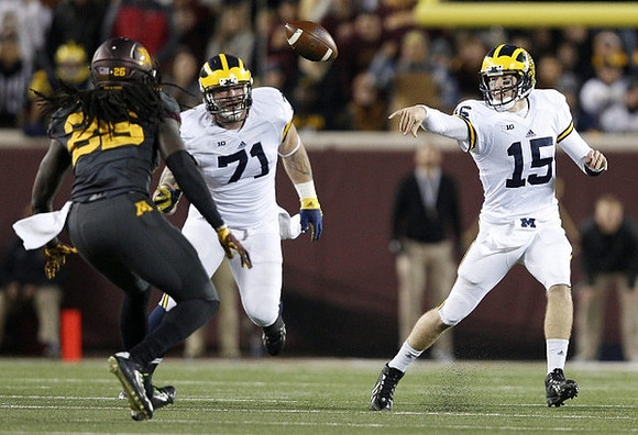 Ben Braden (71) and Jake Rudock (15)