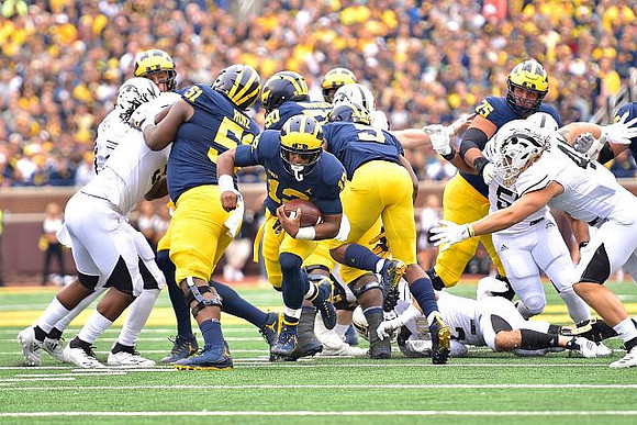 Cesar Ruiz (51), Joel Honigford (59), Chris Evans (12), Donovan Peoples-Jones (9), and Tarik Black (7)