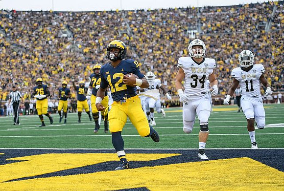 Chris Evans (12), Juwann Bushell-Beatty (76), Donovan Peoples-Jones (9), Cesar Ruiz (51), and Ben Bredeson (74)