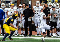 Brandon Watson (28) and Western Michigan Head Coach Tim Lester
