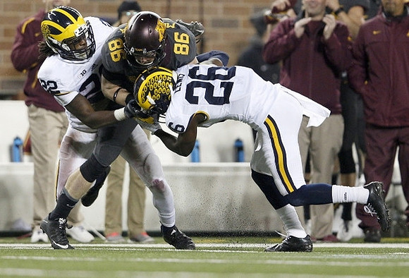 Jarrod Wilson (22) and Jourdan Lewis (26)
