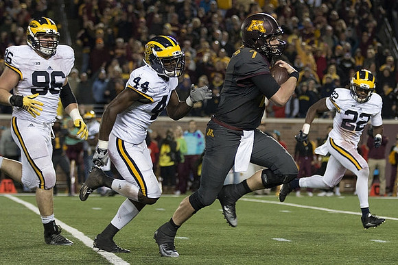 Ryan Glasgow (96), Delano Hill (44), and Jarrod Wilson (22)