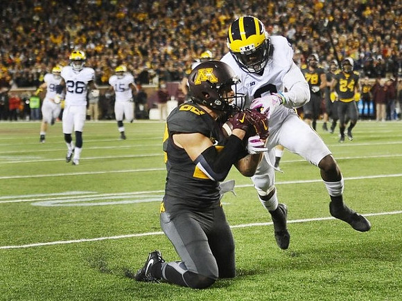 Channing Stribling (8) and Jourdan Lewis (26)