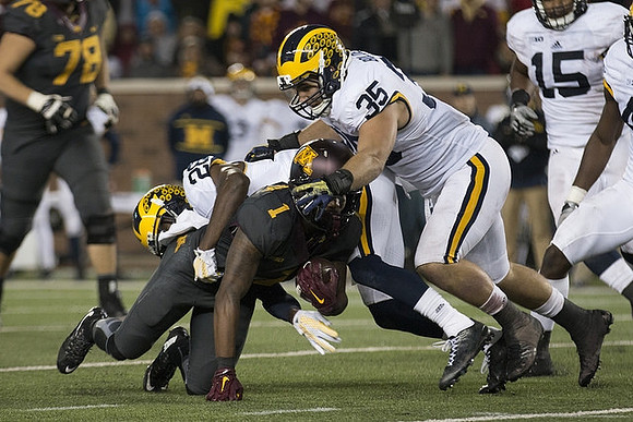 Jourdan Lewis (26), Joe Bolden (35), and James Ross (15)