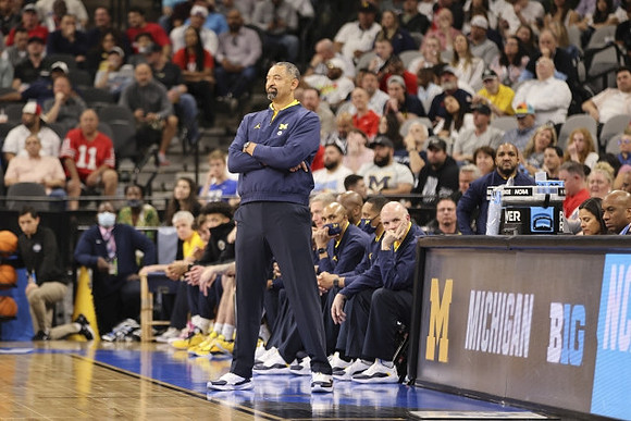 Juwan Howard, Saddi Washington, and Phil Martelli