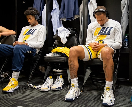 Jace Howard (25) and DeVante' Jones (12)