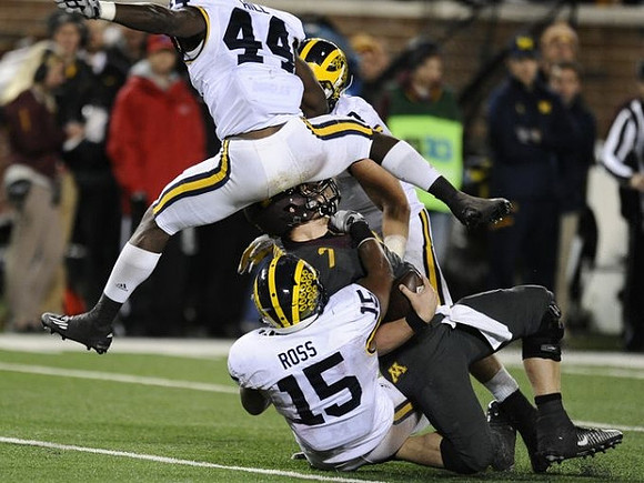 Delano Hill (44) and James Ross (15)