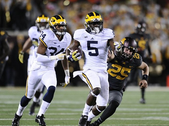 Jeremy Clark (34) and Jabrill Peppers (5)