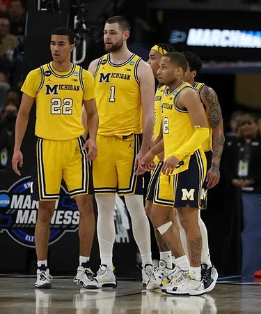 Caleb Houstan (22), Hunter Dickinson (1), Terrance Williams II (5), DeVante' Jones (12), and Eli Brooks (55)