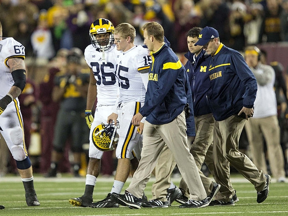 Kyle Kalis (67), Jehu Chesson (86), and Jake Rudock (15)