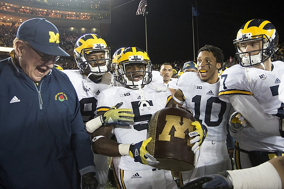 Jon Falk, Maurice Ways (85), Jabrill Peppers (5), Da'Mario Jones (10), Shane Morris (7), and The Little Brown Jug