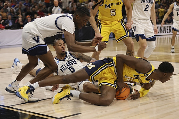 Moussa Diabate (14) and Terrance Williams II (5)