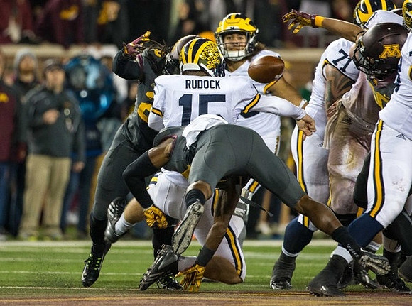 Jake Rudock (15), Drake Johnson (20), and Ben Braden (71)