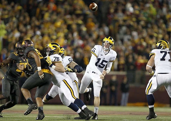 Erik Magnuson (78), Mason Cole (52), Jake Rudock (15), and Ben Braden (71)