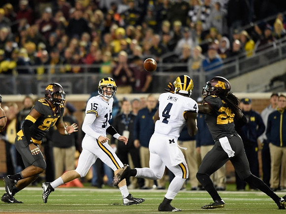 Jake Rudock (15) and De'Veon Smith (4)