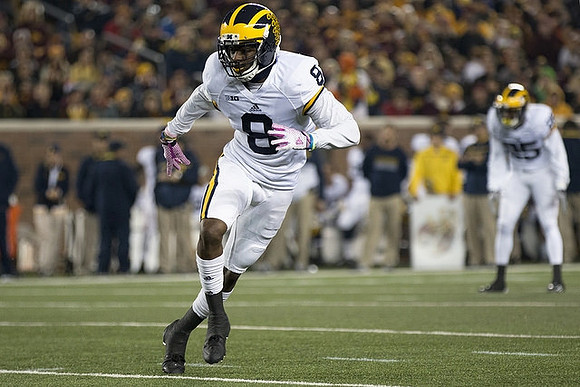 Channing Stribling (8) and Dymonte Thomas (25)