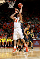 Evan Smotrycz (23), Jordan Morgan (52), and Zack Novak (0)