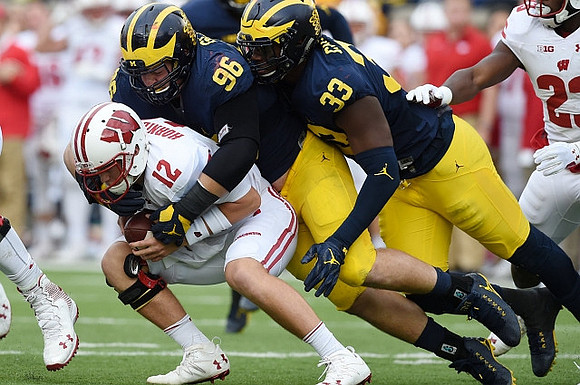 Ryan Glasgow (96) and Taco Charlton (33)