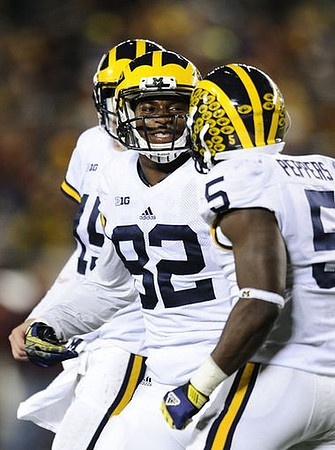Amara Darboh (82) and Jabrill Peppers (5)
