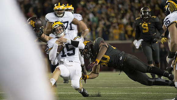 Jake Rudock (15), Grant Newsome (77), and Joe Kerridge (36)