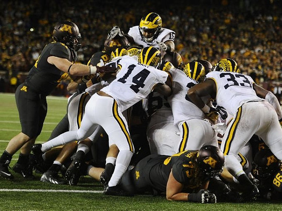 Allen Gant (14), James Ross (15), and Taco Charlton (33)