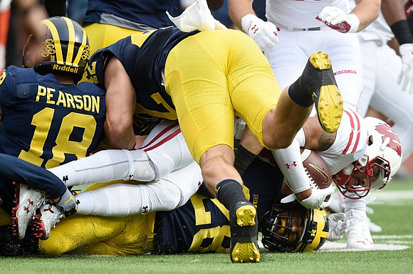 AJ Pearson (18) and Brandon Watson (28)