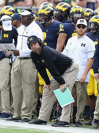 Jim Harbaugh and Tyrone Wheatley Sr.