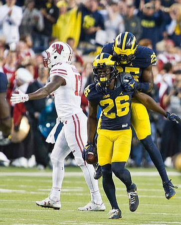 Jourdan Lewis (26) and Dymonte Thomas (25)