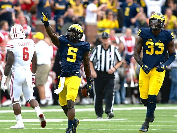Jabrill Peppers (5) and Taco Charlton (33)
