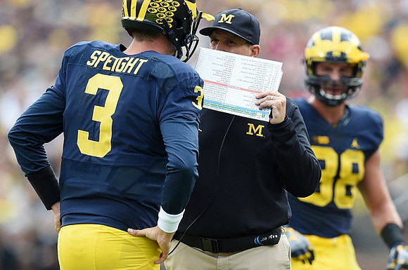 Wilton Speight (3), Jim Harbaugh, and Jake Butt (88)