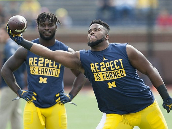 De'Veon Smith (4) and Maurice Hurst (73)