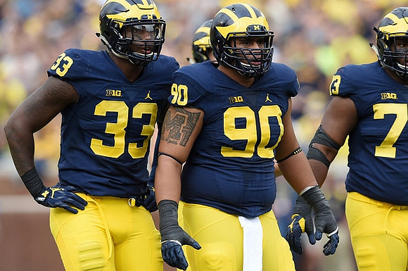 Taco Charlton (33), Bryan Mone (90), and Maurice Hurst (73)