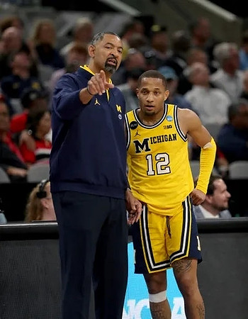 Juwan Howard and DeVante' Jones (12)