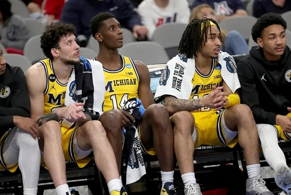 Brandon Johns Jr. (23), Moussa Diabate (14), Frankie Collins (10), and Kobe Bufkin (2)