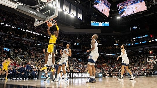 Moussa Diabate (14) and Brandon Johns Jr. (23)