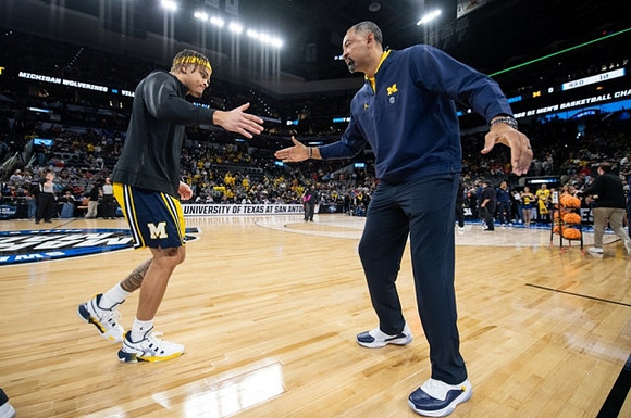 Terrance Williams II (5) and Juwan Howard