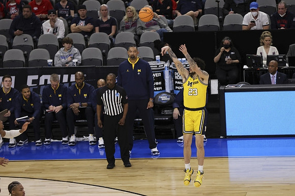 Juwan Howard and Brandon Johns Jr. (23)