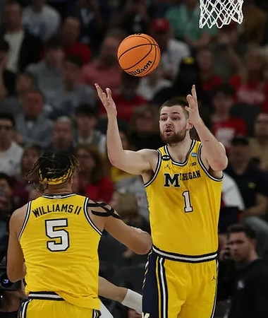 Terrance Williams II (5) and Hunter Dickinson (1)