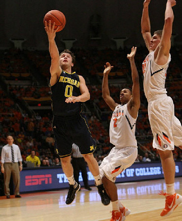 Zack Novak (0) and John Beilein