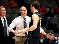 Jeff Meyer, John Beilein, and Zack Novak (0)