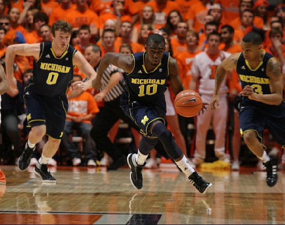 Zack Novak (0),Tim Hardaway Jr. (10), and Trey Burke (3)