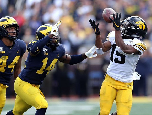 Cameron McGrone (44) and Josh Metellus (14)