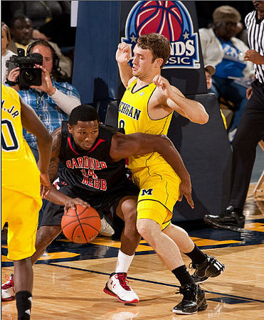 Tim Hardaway Jr. (10) and Zack Novak (0)