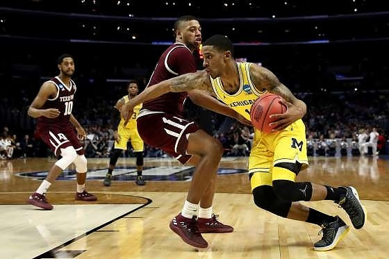 Zavier Simpson (3) and Charles Matthews (1)