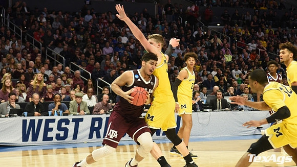 Moritz Wagner (13), Jordan Poole (2), Muhammad-Ali Abdur-Rahkman (12), and Isaiah Livers (4)